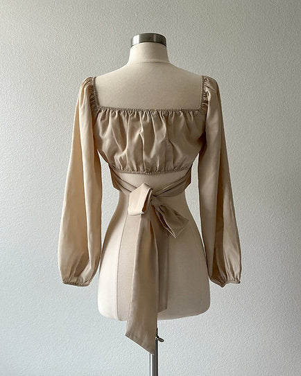 Megan — Blusa con lazo