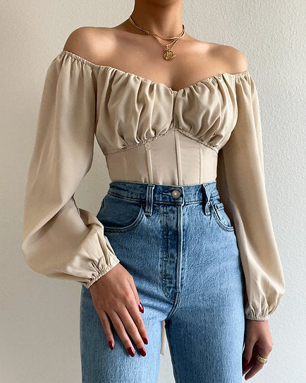 Megan — Blusa con lazo