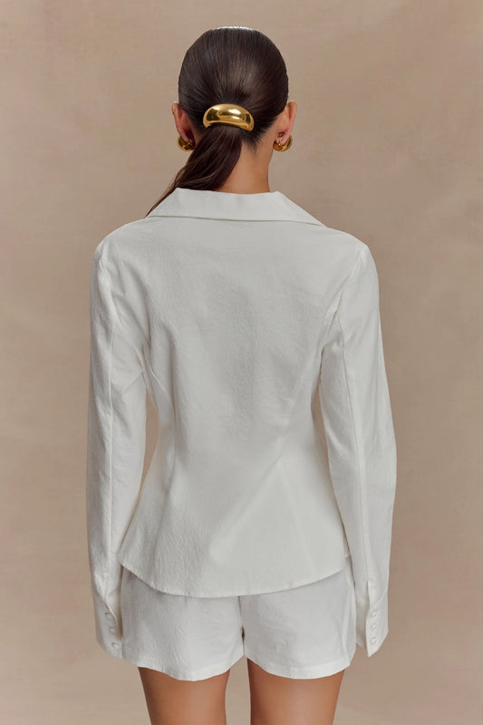 Naiara — Conjunto: blusa con lazo y short encauchado