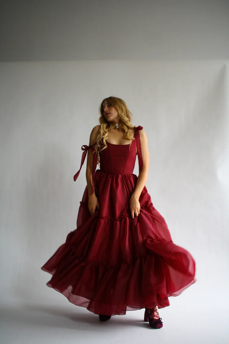 Saffira — Vestido maxi corset con volantes y lazos
