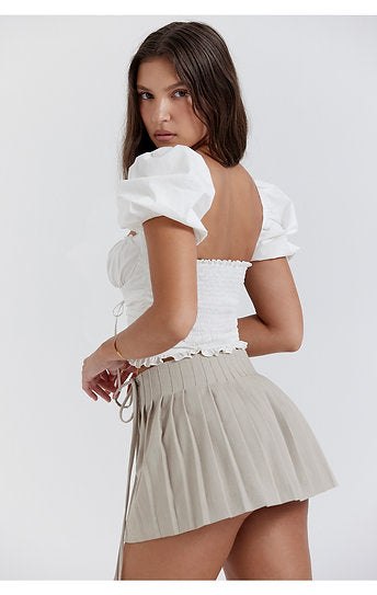 Saskia — Blusa encauchada