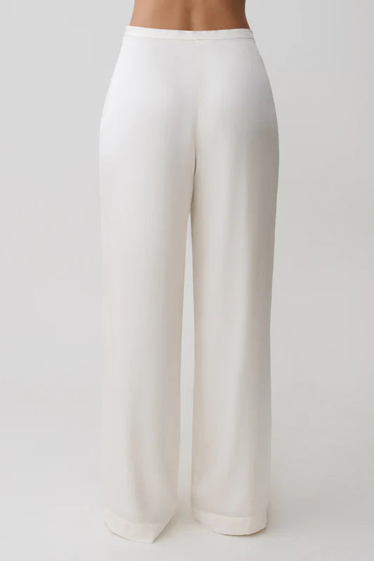 Sheila — Conjunto: blusa strapless y pantalón ancho