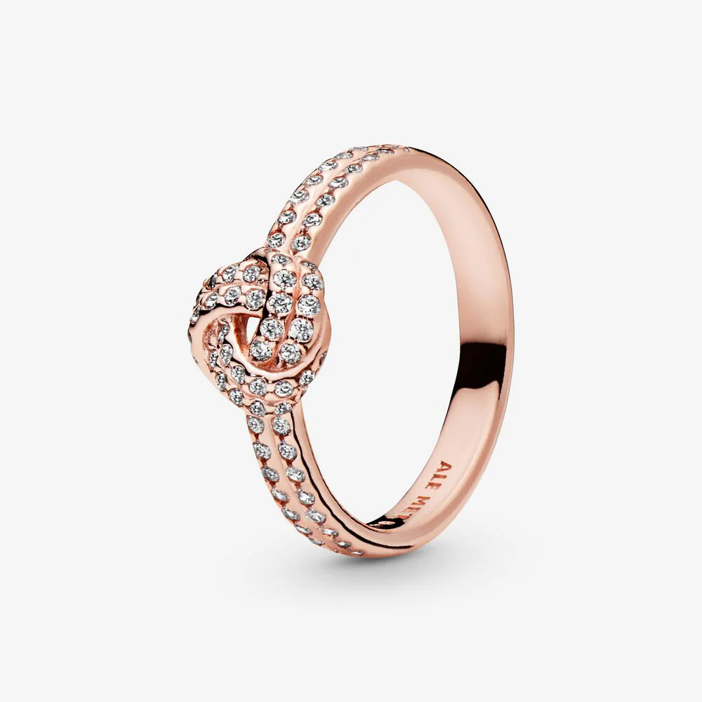 Anillo nudo oro rosa con circonitas