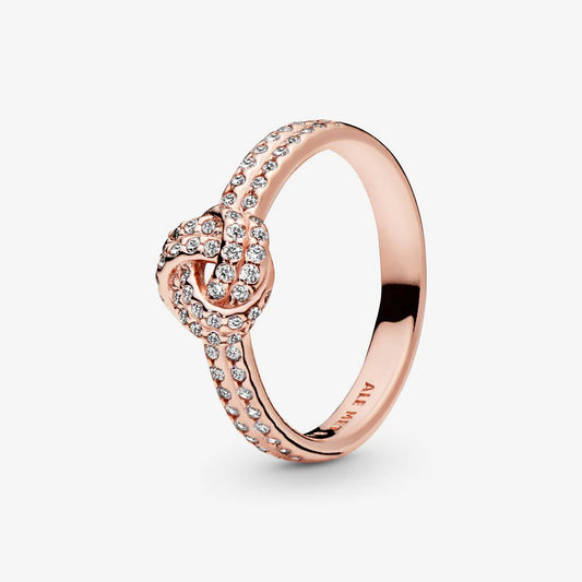 Anillo nudo oro rosa con circonitas
