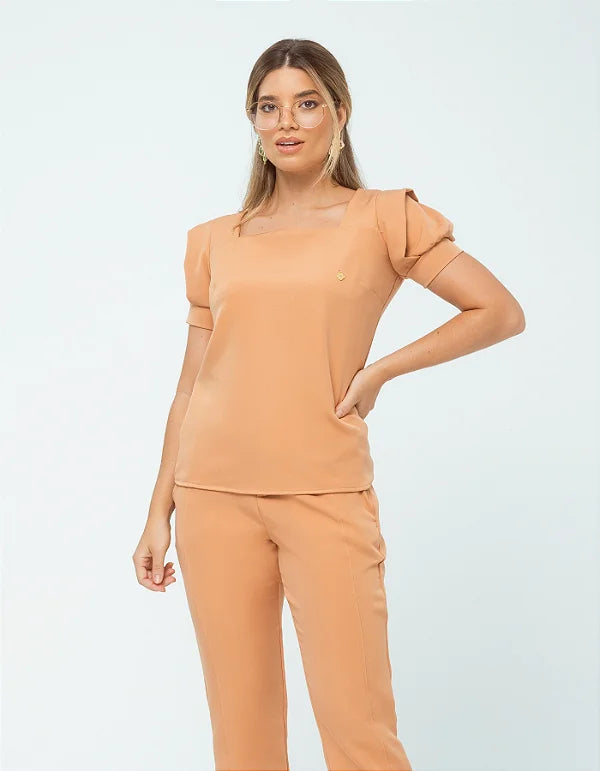 Adriana — Uniforme con pantalón encauchado