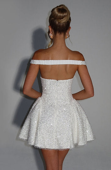 Amelia — Vestido mini con volantes