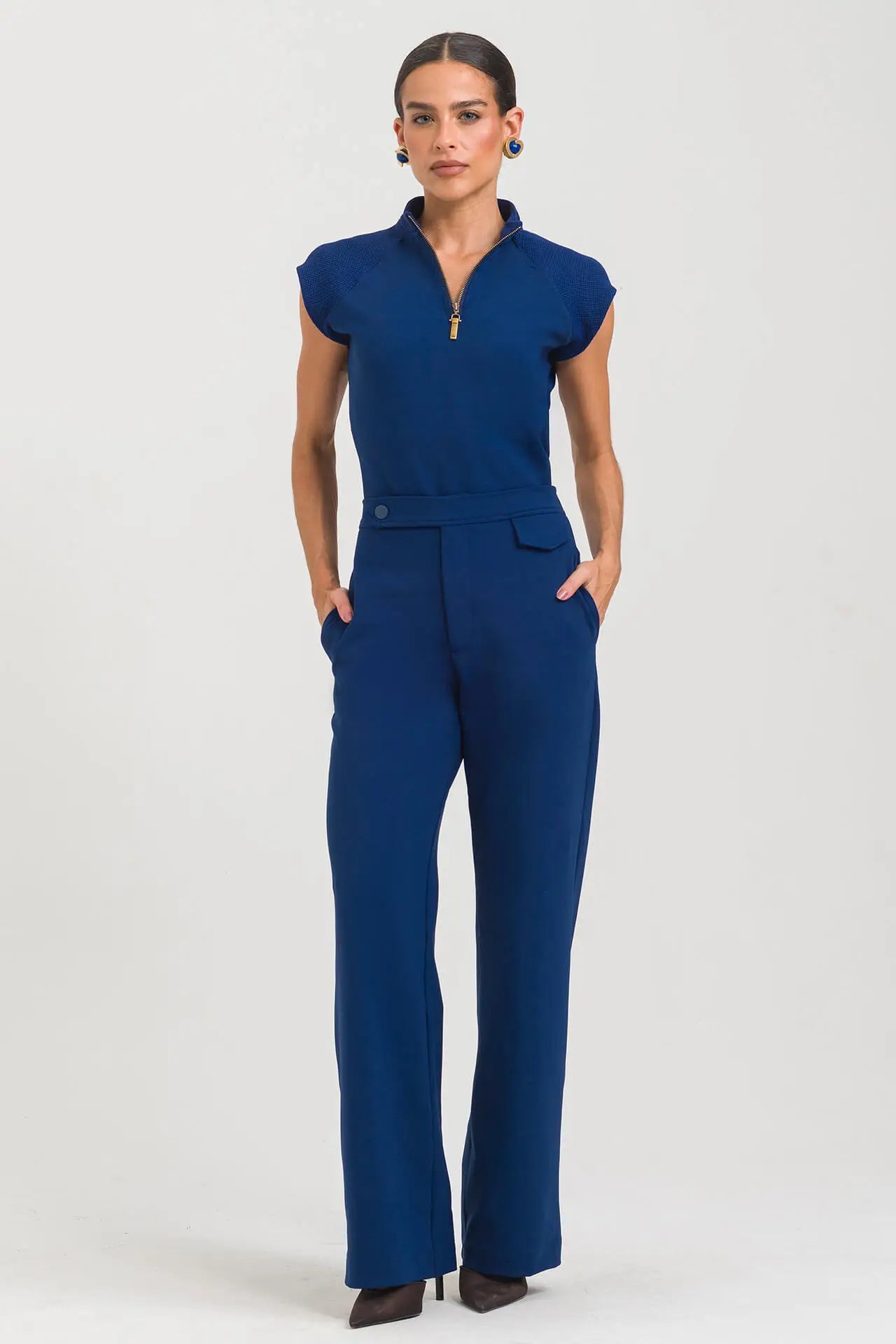 Anahí — Uniforme con pantalón encauchado