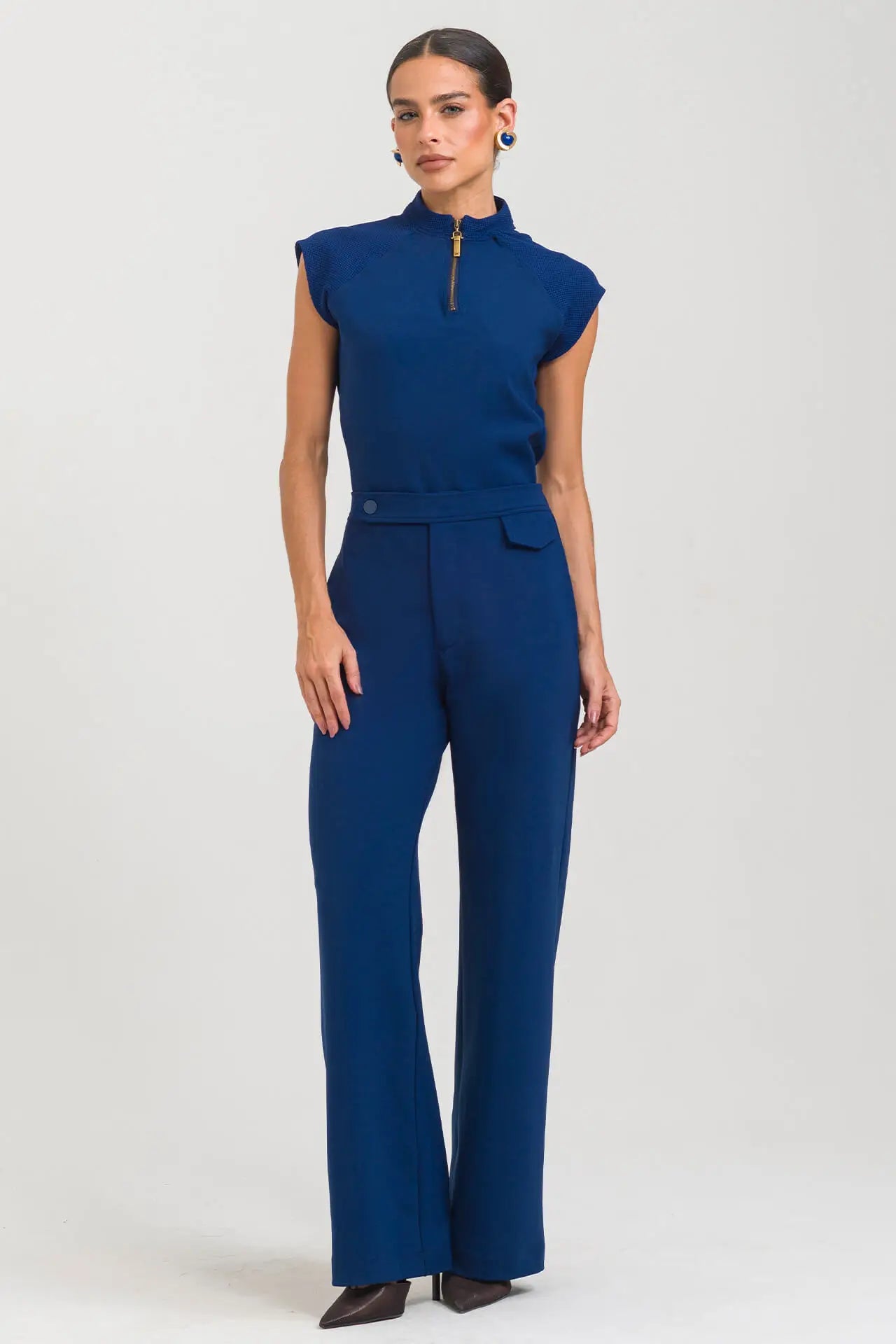 Anahí — Uniforme con pantalón encauchado