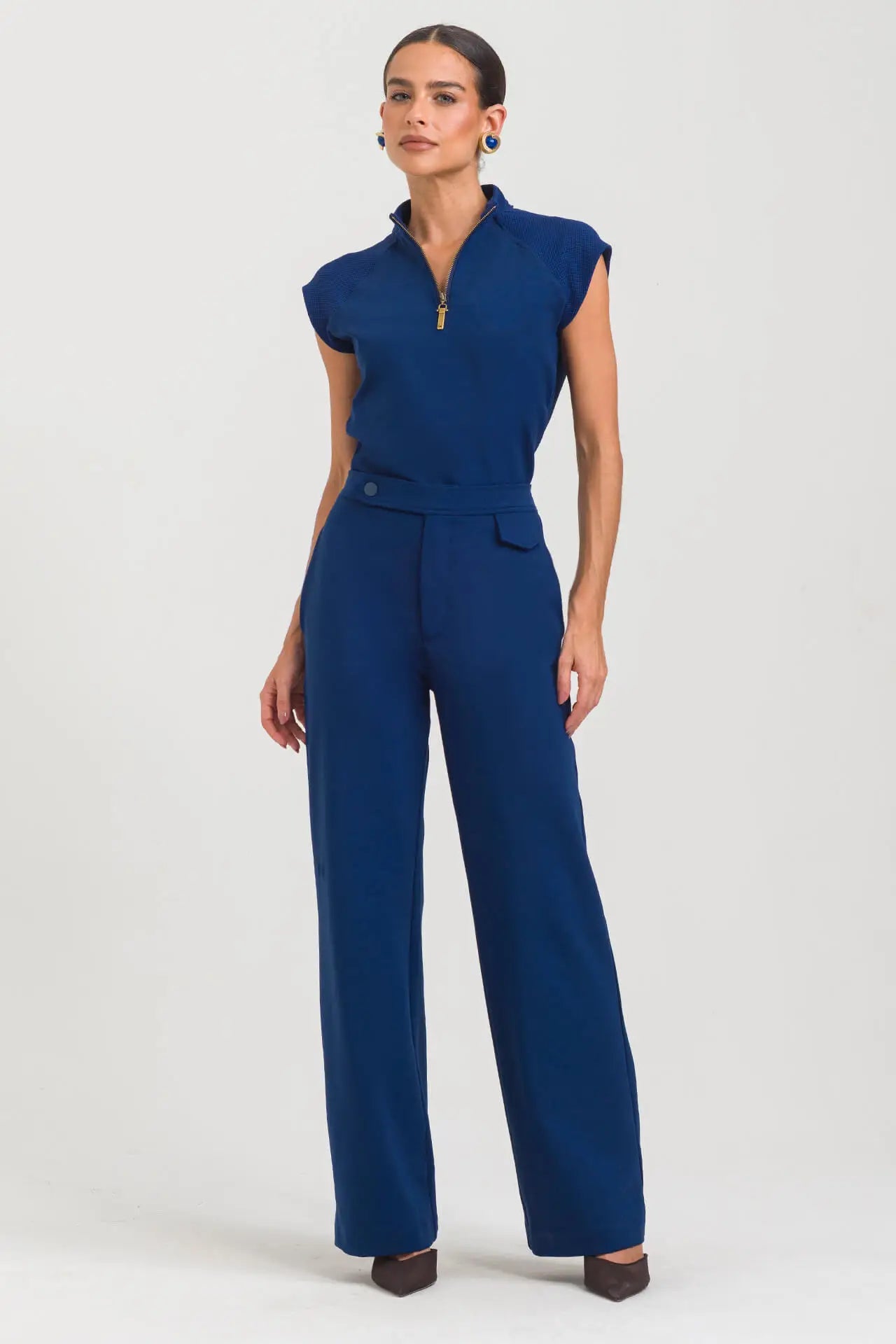 Anahí — Uniforme con pantalón encauchado