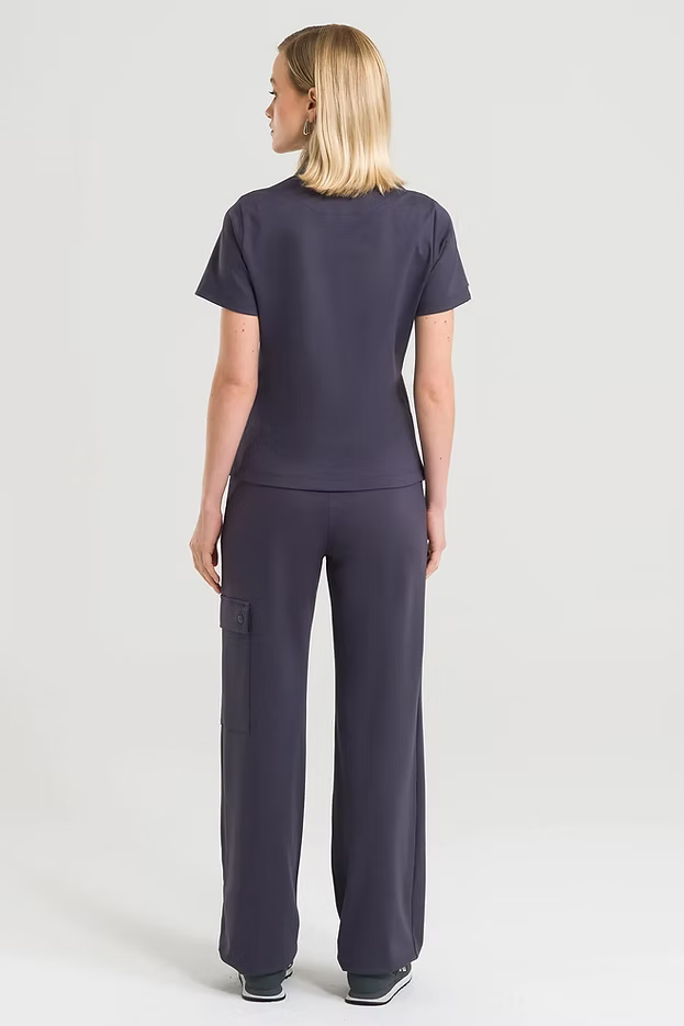 Anais — Uniforme con pantalón encauchado