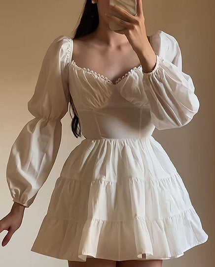 Antonella — Vestido mini con espalda descubierta y lazo