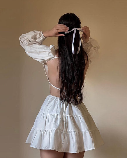 Antonella — Vestido mini con espalda descubierta y lazo