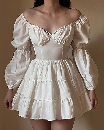 Antonella — Vestido mini con espalda descubierta y lazo