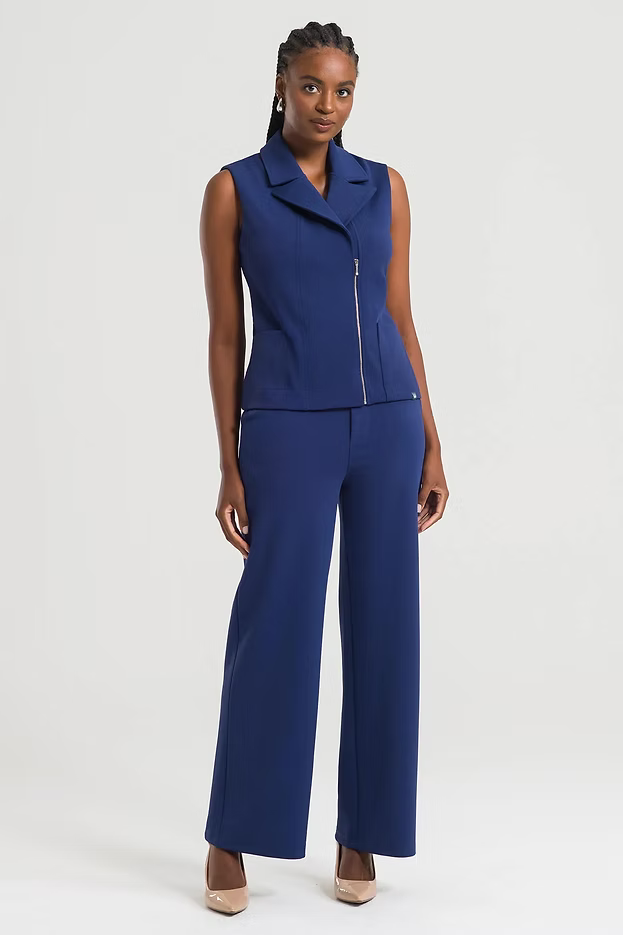 Antonia — Uniforme con pantalón encauchado
