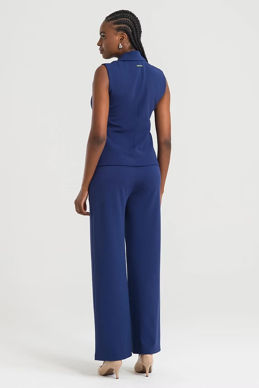 Antonia — Uniforme con pantalón encauchado