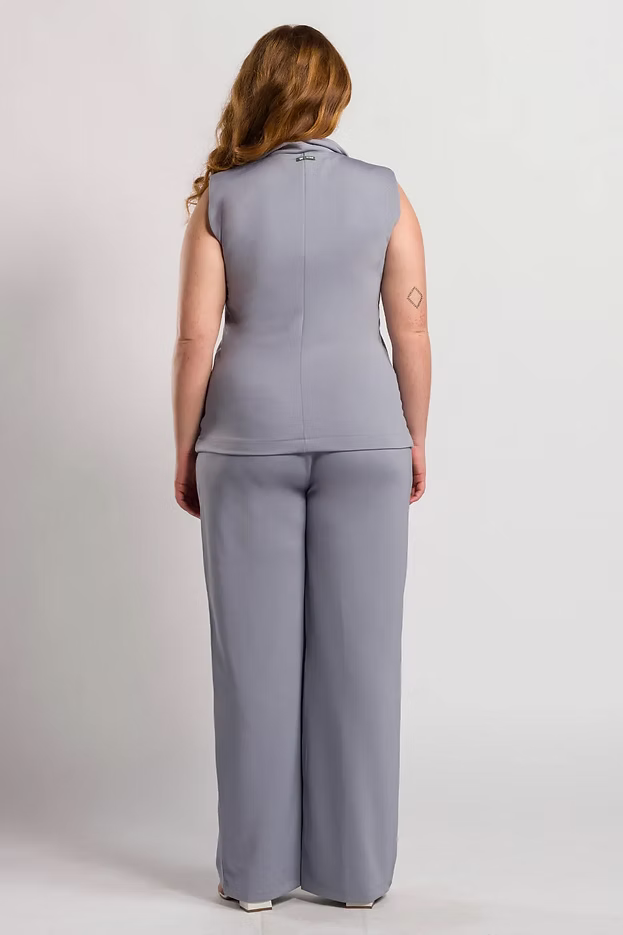Antonia — Uniforme con pantalón encauchado