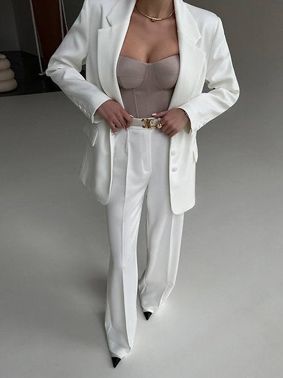 Eliza — Conjunto: blazer, croptop corset y pantalón