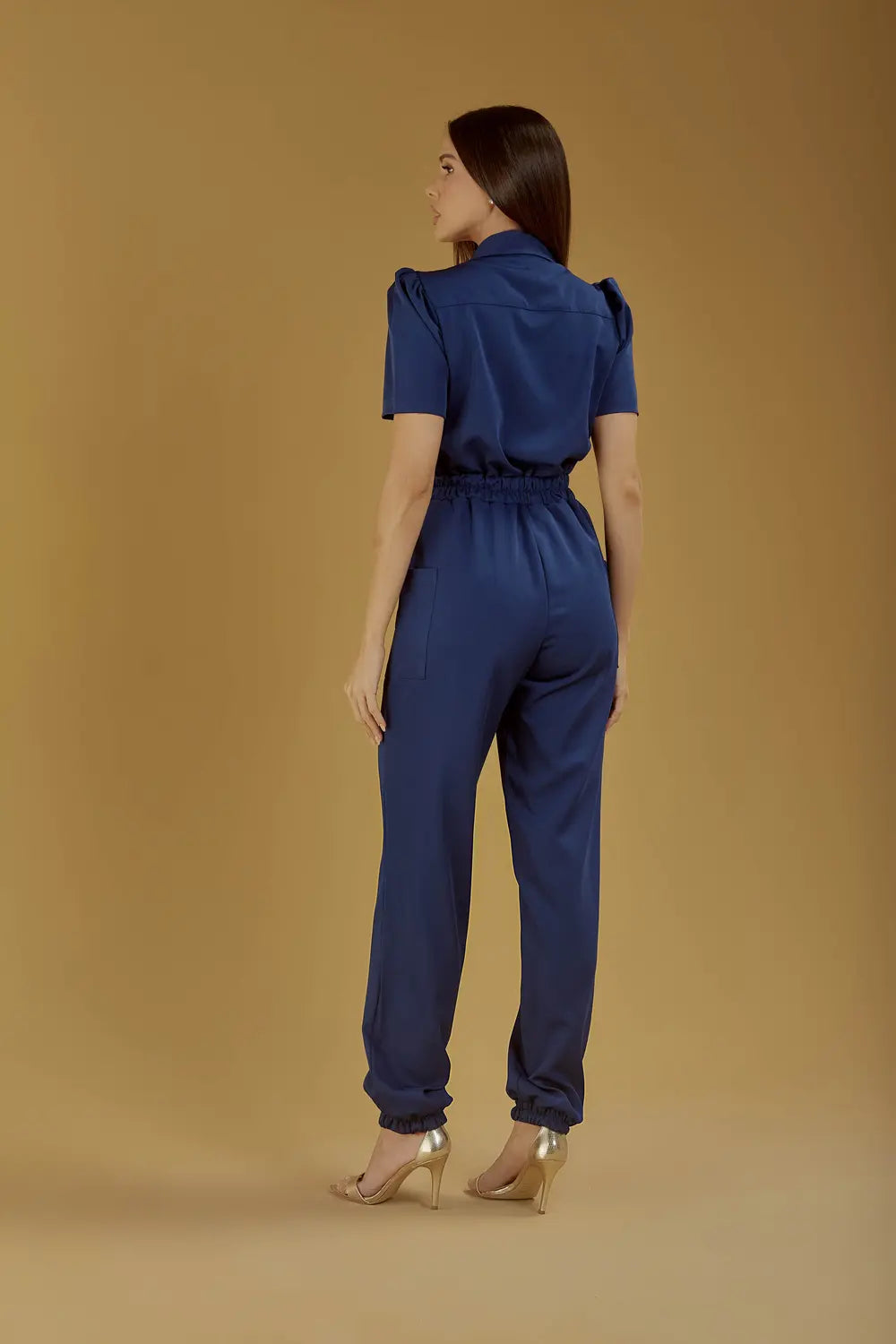 Elizabeth — Uniforme enterizo con pantalón encauchado y lazo