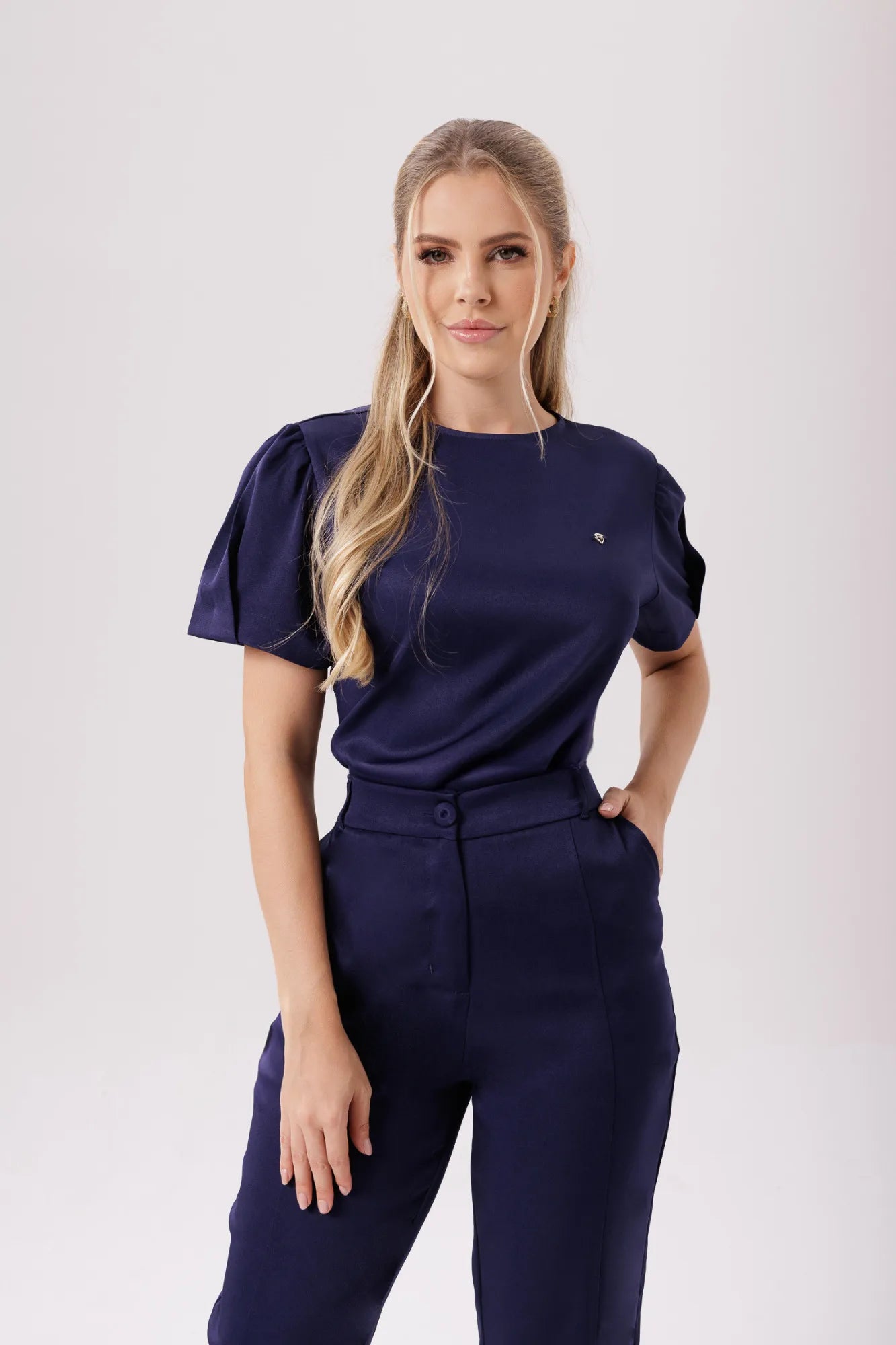 Érica — Uniforme con pantalón encauchado