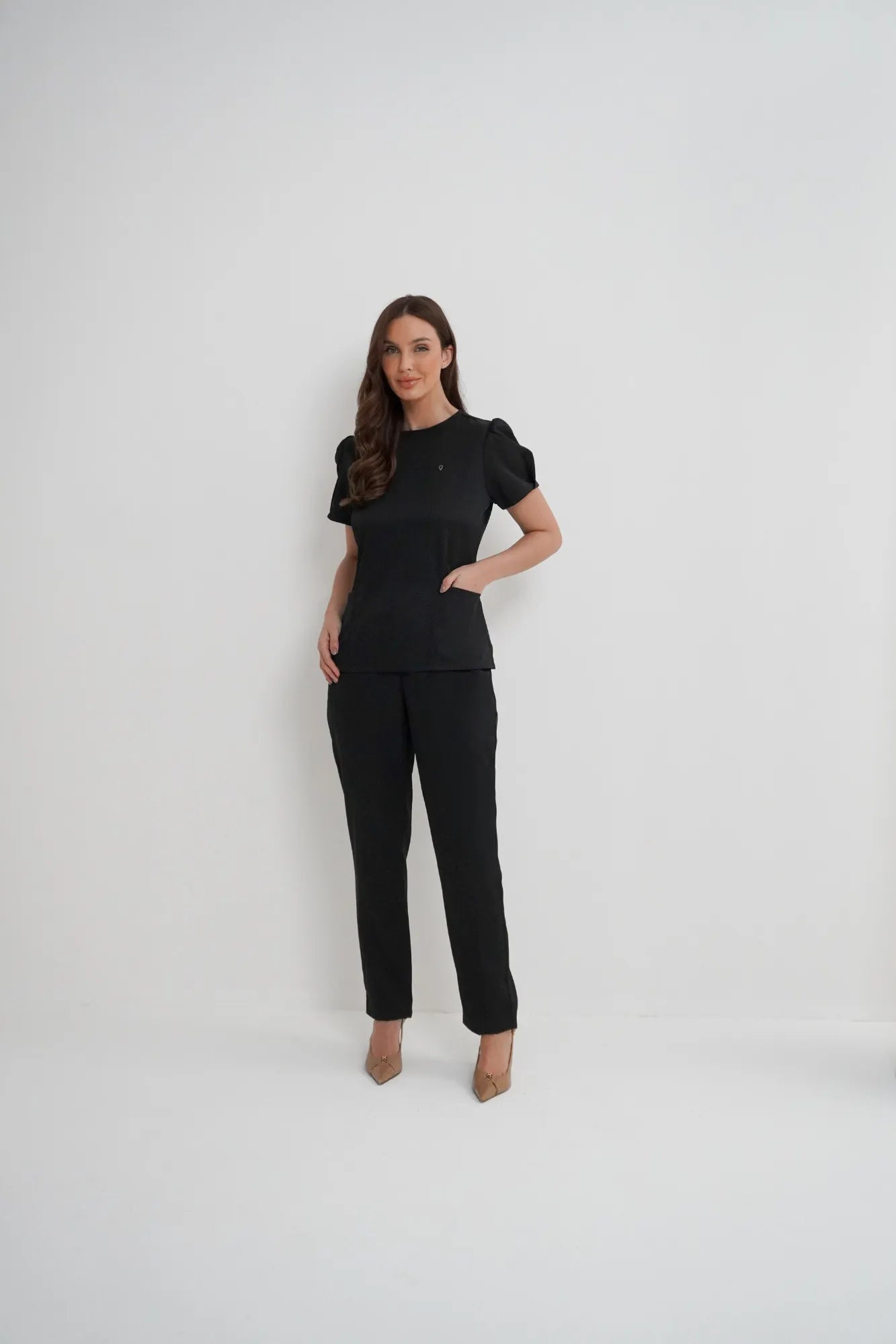 Érica — Uniforme con pantalón encauchado