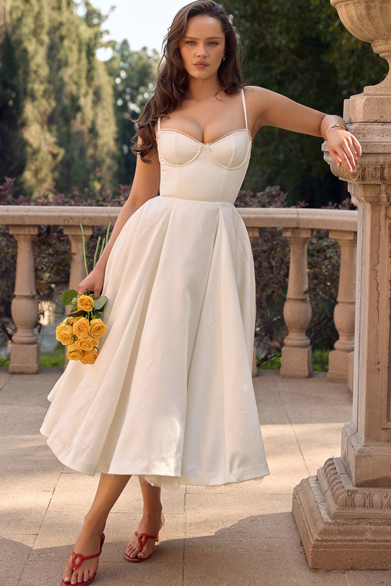 Evangeline — Vestido midi con transparencia a los costados