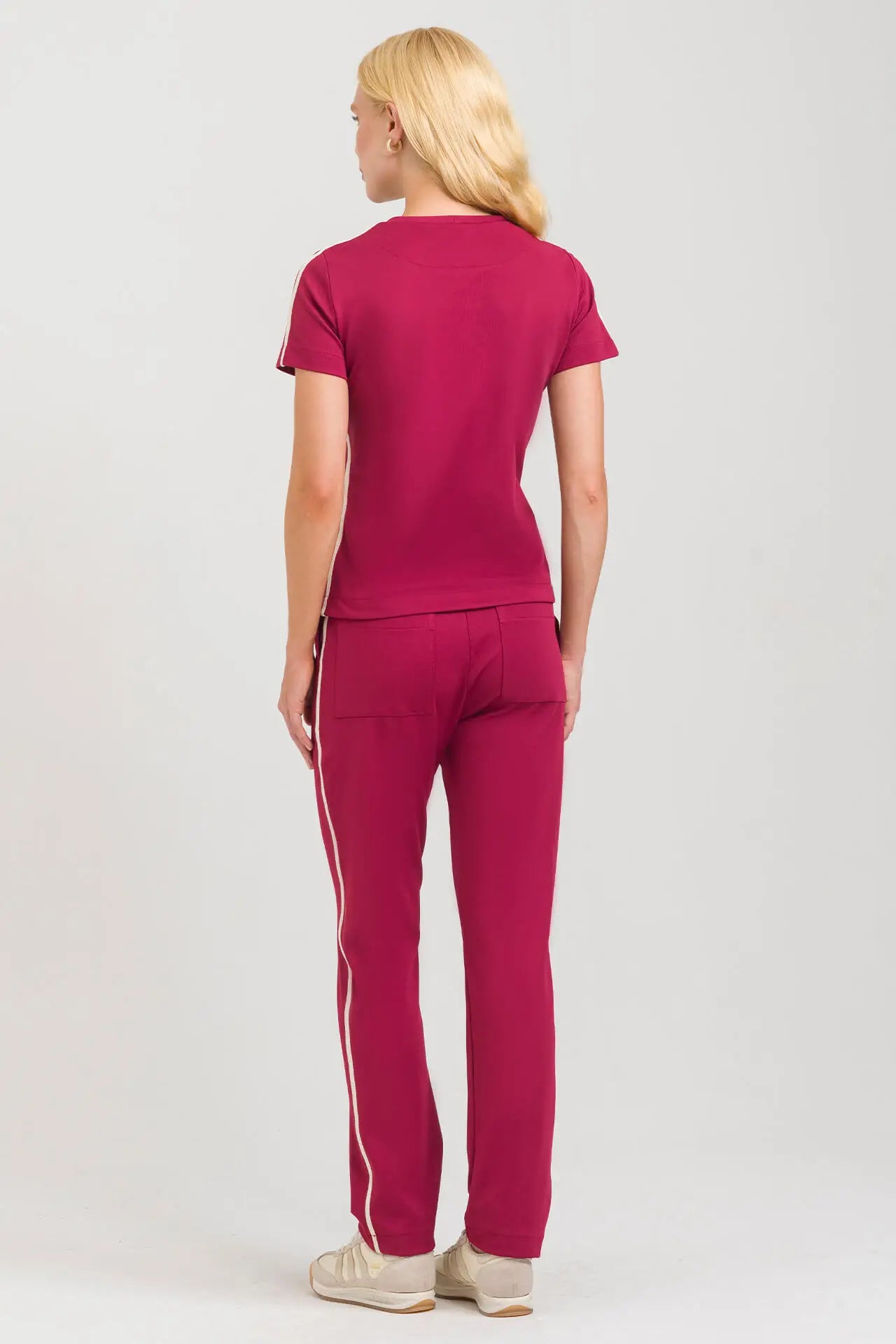 Helia — Uniforme con pantalón encauchado