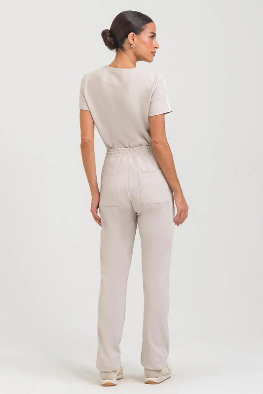 Helia — Uniforme con pantalón encauchado