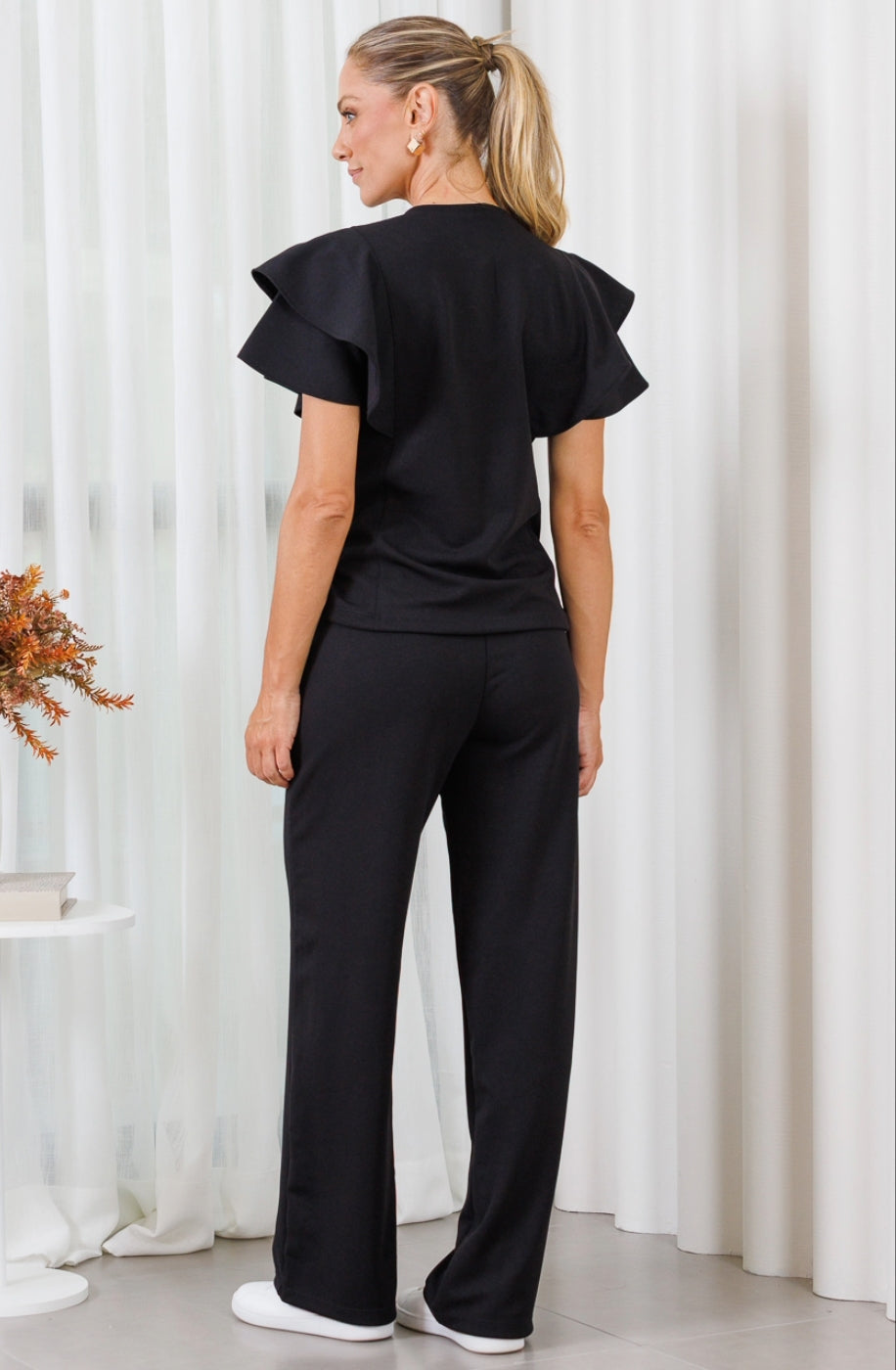 Jana — Uniforme con pantalón encauchado