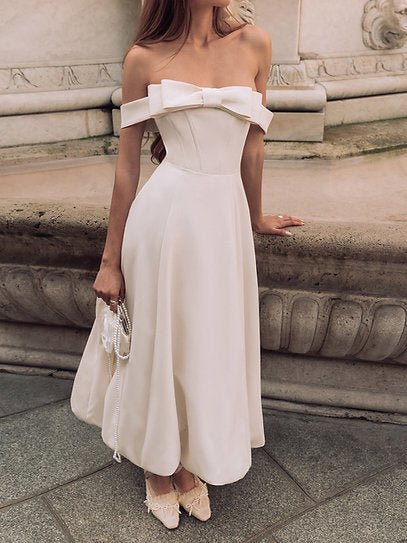 Julia — Vestido midi falda globo con moño