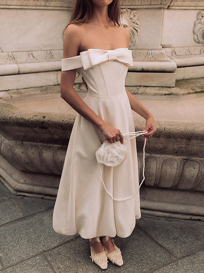 Julia — Vestido midi falda globo con moño