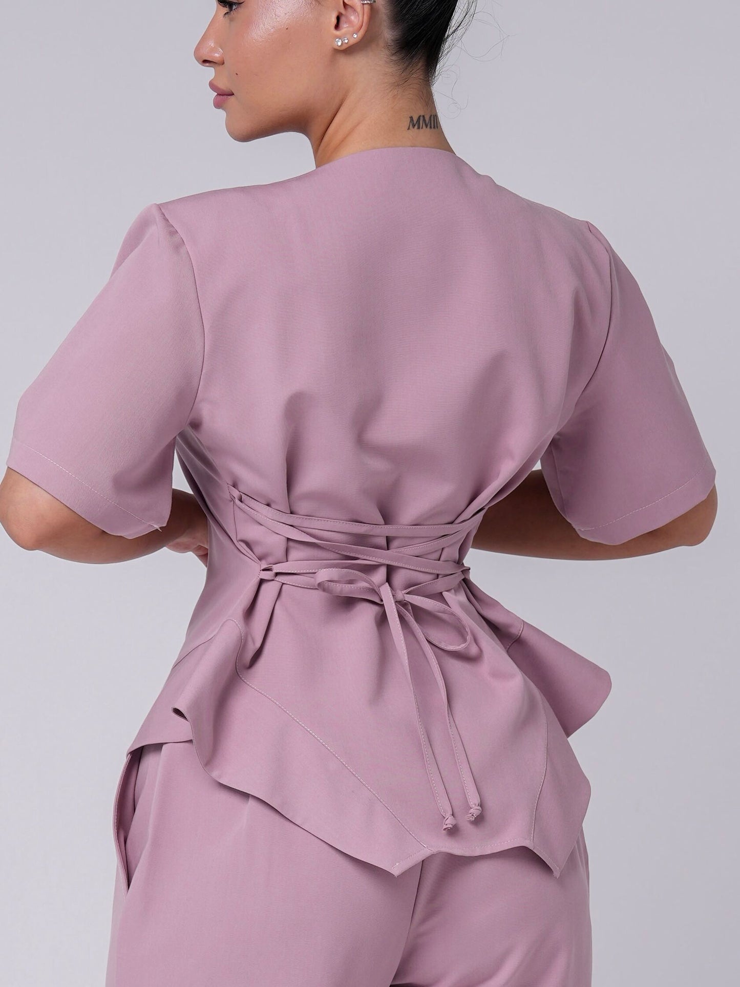 Lía — Uniforme con pantalón encauchado y corset