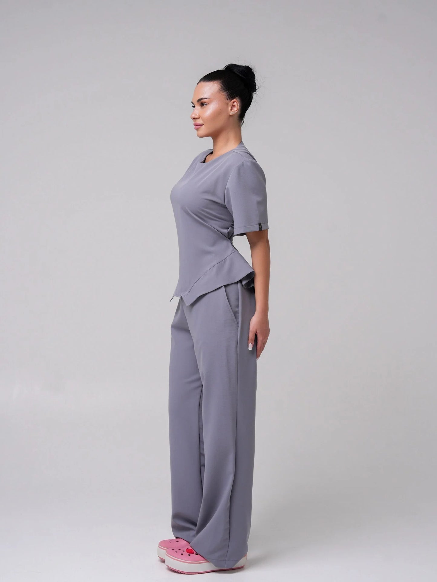 Lía — Uniforme con pantalón encauchado y corset