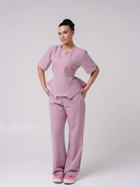 Lía — Uniforme con pantalón encauchado y corset