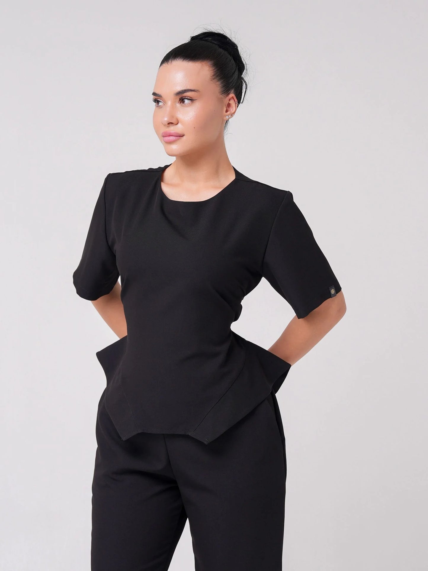 Lía — Uniforme con pantalón encauchado y corset
