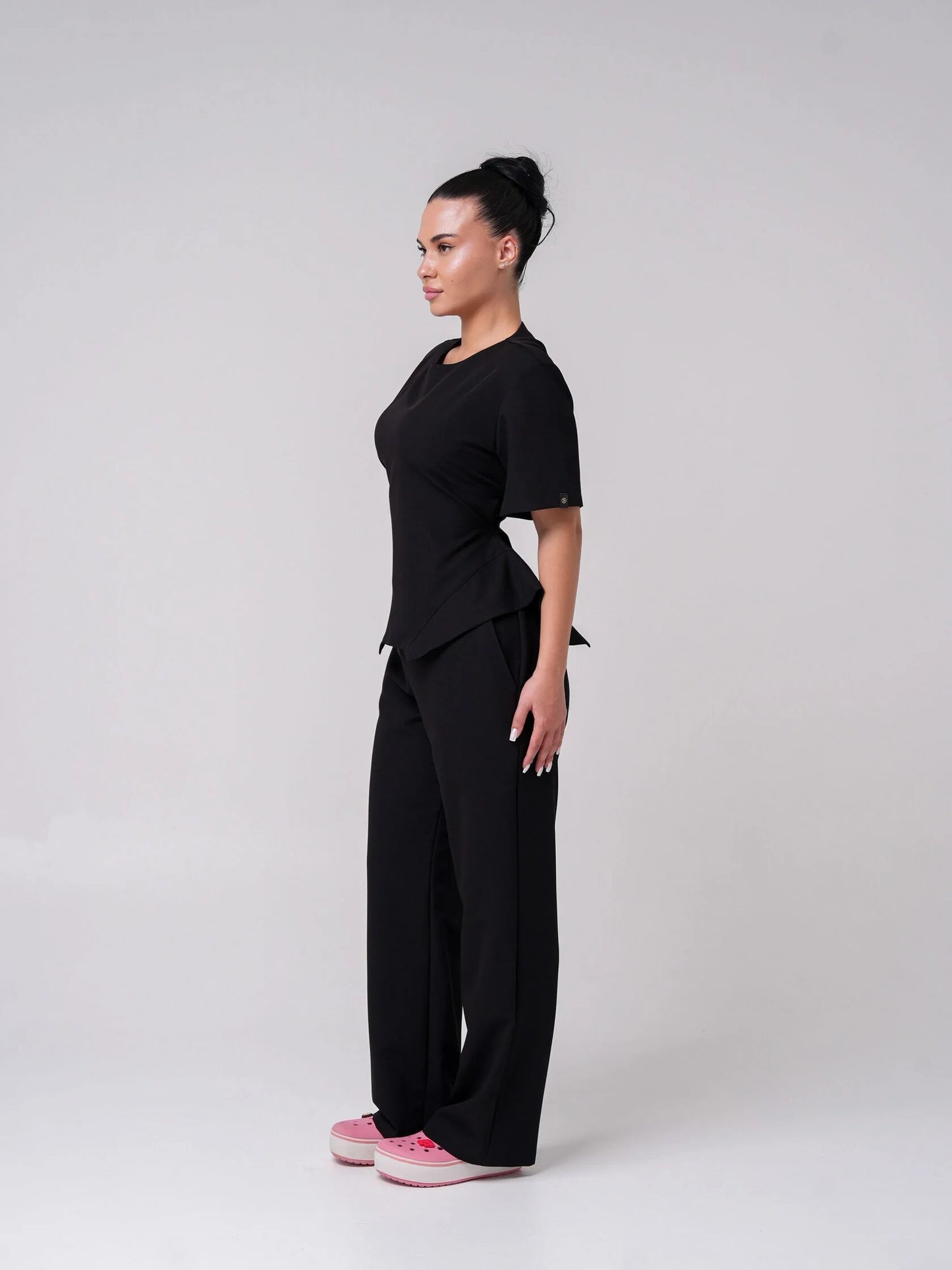 Lía — Uniforme con pantalón encauchado y corset