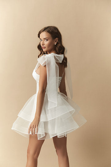 Lucine — Vestido mini corset con volantes y lazos