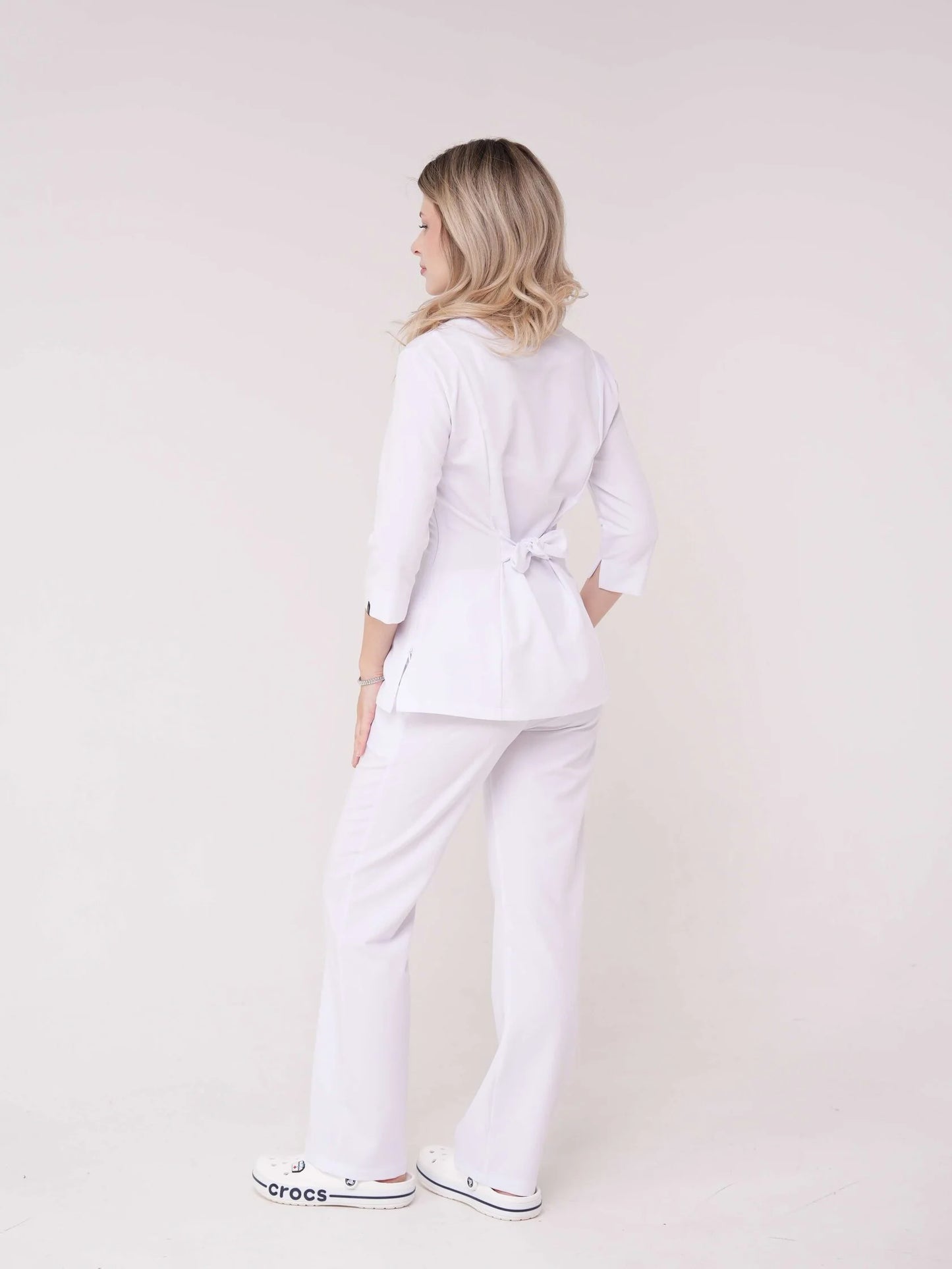Luna — Uniforme con pantalón encauchado y lazo