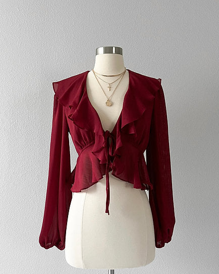 Nala — Blusa con volantes y lazo