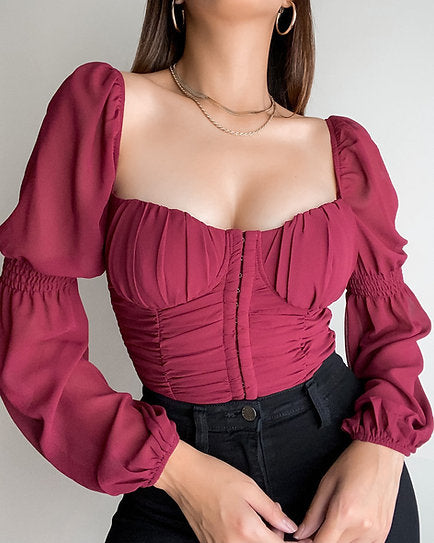 Nora — Blusa encauchada