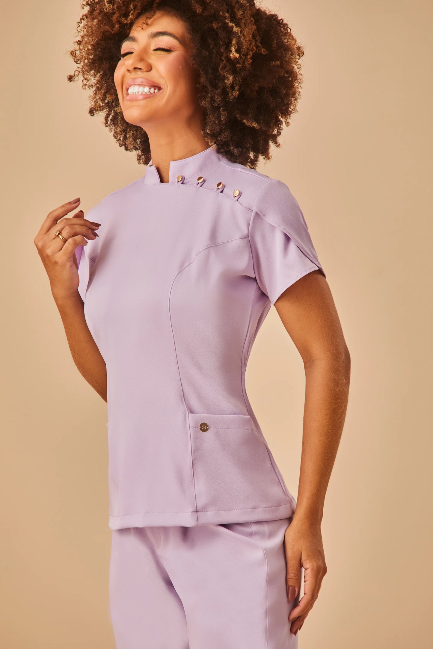 Sara — Uniforme encauchado