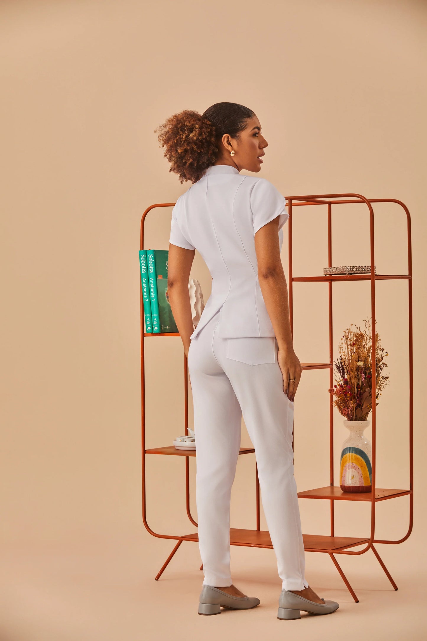 Sara — Uniforme encauchado