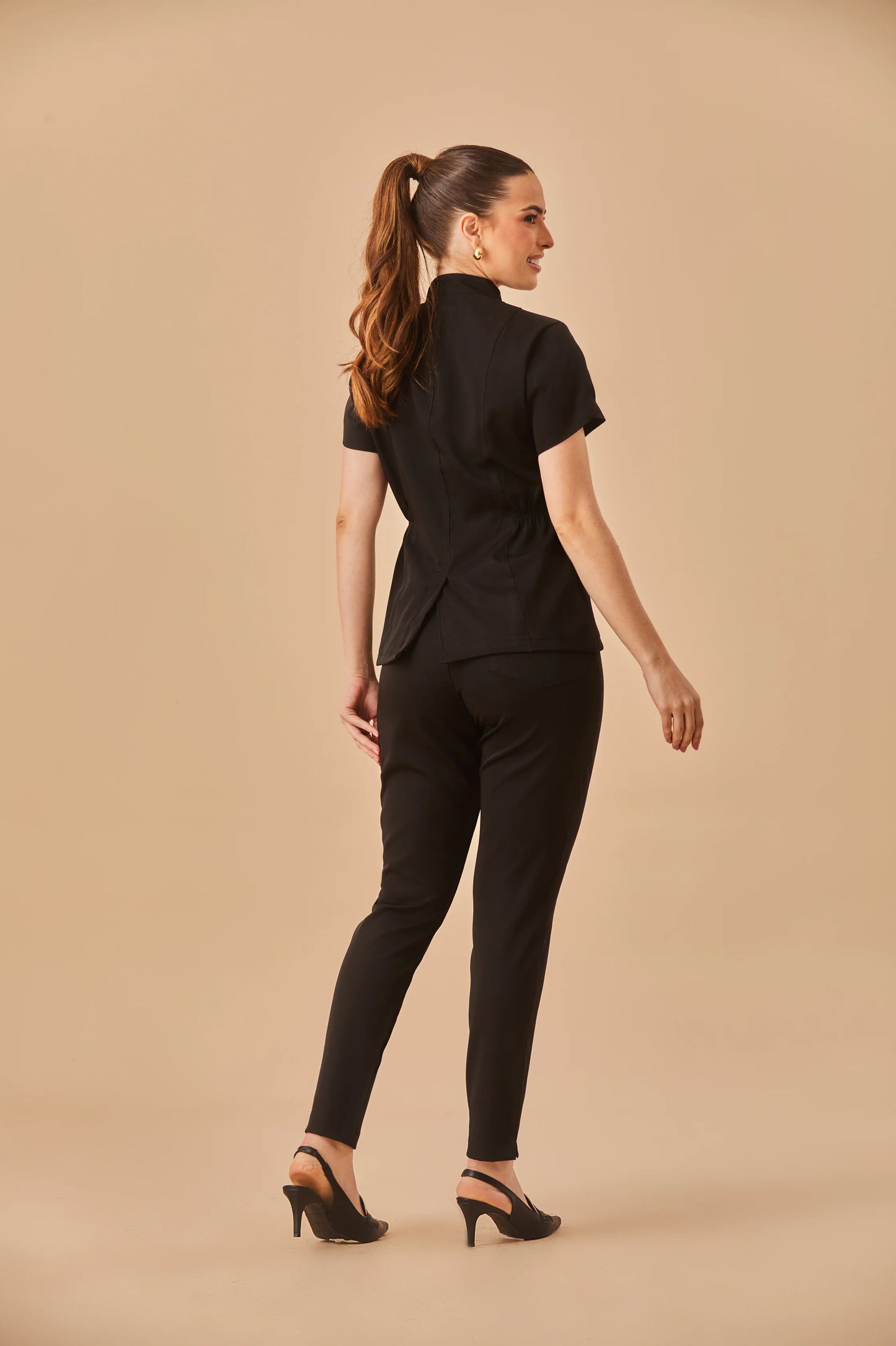 Sara — Uniforme encauchado