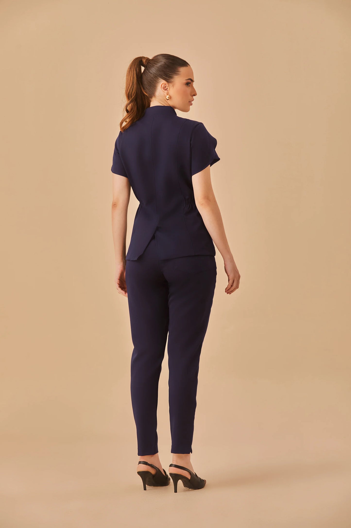 Sara — Uniforme encauchado