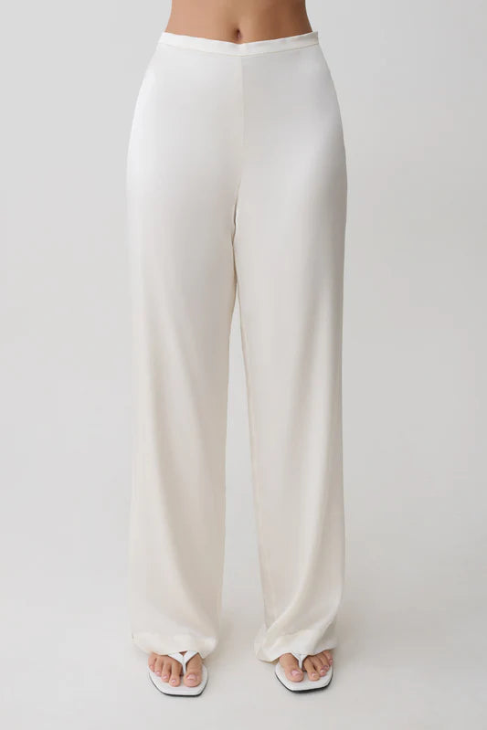 Sheila — Conjunto: blusa strapless y pantalón ancho