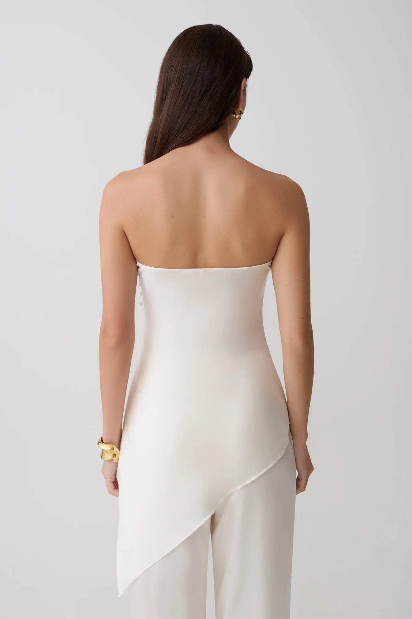 Sheila — Conjunto: blusa strapless y pantalón ancho
