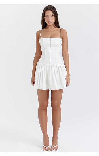 Vianne — Vestido mini con lazos y falda plisada