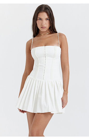 Vianne — Vestido mini con lazos y falda plisada