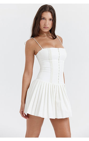 Vianne — Vestido mini con lazos y falda plisada