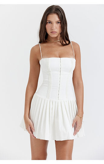 Vianne — Vestido mini con lazos y falda plisada