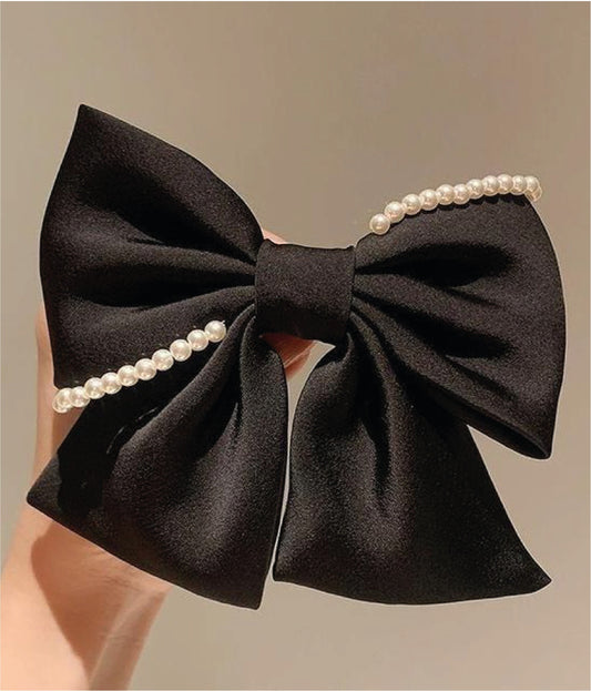 Moño decorado con perlas